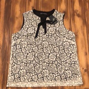 Black and white sleeveless lace top